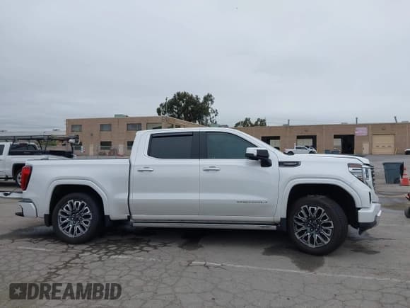 ✅ 2023 GMC Sierra 1500 Denali Ultimate • VIN: 1GTUUHEL2PZ298886 • Лот: 41976852. Опубликован ранее на IAAI с пробегом 15 586 миль. Бесплатный доступ к архиву аукционных продаж из США и подробный отчёт об истории автомобиля на DreamBid. Изображение 14.