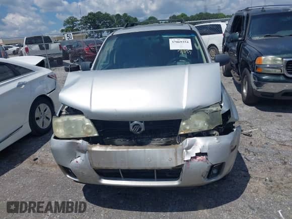 2005 Mercury Mariner Luxury z VIN 4M2YU561X5DJ09502, wystawiony jako IAAI lot #37069354 z przebiegiem Nie podano mil oraz . Historia ofert i sprzedaży dostępna na DreamBid. Obrazek 12.