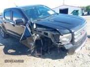 ✅ 2016 GMC Canyon 4WD SLE • VIN: 1GTP6CE10G1365458 • Lot: 42114141. Listed on IAAI with 117,488 mi. Free auction sales archive from the USA and detailed vehicle history report at DreamBid. Image 6.