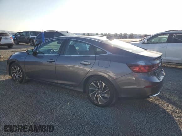 ✅ 2021 Honda Insight Touring • VIN: 19XZE4F91ME005517 • Лот: 84916665. Опубликован ранее на Copart с пробегом 66 980 миль. Бесплатный доступ к архиву аукционных продаж из США и подробный отчёт об истории автомобиля на DreamBid. Изображение 2.
