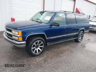 1999 Chevrolet Suburban z VIN 3GNFK16R2XG122257, wystawiony jako IAAI lot #43360513 z przebiegiem 159 665 mil mil oraz . Historia ofert i sprzedaży dostępna na DreamBid. Obrazek 2.