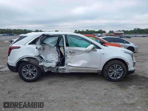 ✅ 2023 Cadillac XT5 AWD Premium Luxury • VIN: 1GYKNDRSXPZ104274 • Lot: 43569714. Listed on IAAI with 49,006 mi. Free auction sales archive from the USA and detailed vehicle history report at DreamBid. Image 13.