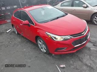 2018 Chevrolet Cruze Premier z VIN 3G1BF6SMXJS619184, wystawiony jako IAAI lot #41704944 z przebiegiem 160 850 mil mil oraz . Historia ofert i sprzedaży dostępna na DreamBid. Obrazek 1.