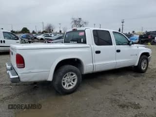 ✅ 2002 Dodge Dakota SLT • VIN: 1B7HL48NX2S638927 • Lot: 49182285. Wystawiony na Copart z przebiegiem 376 546 mil. Bezpłatny archiwum sprzedaży aukcyjnych z USA i szczegółowy raport historii pojazdu na DreamBid. Zdjęcie 3.