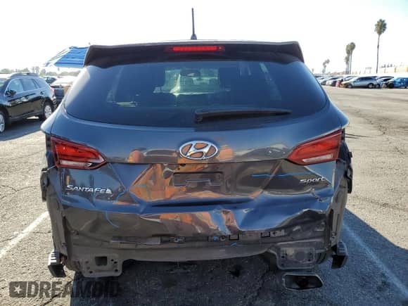 2018 Hyundai Santa Fe 2.4L with VIN 5XYZT3LB2JG509984, listed as a Copart auction lot 85510595 with 103,988 mi miles and Salvage title. Bid and sale history available at DreamBid. Image 6.