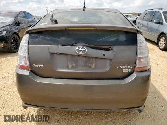 ✅ 2006 Toyota Prius • VIN: JTDKB20U263183300 • Лот: 83995795. Опубликован ранее на Copart с пробегом 216 896 миль. Бесплатный доступ к архиву аукционных продаж из США и подробный отчёт об истории автомобиля на DreamBid. Изображение 6.