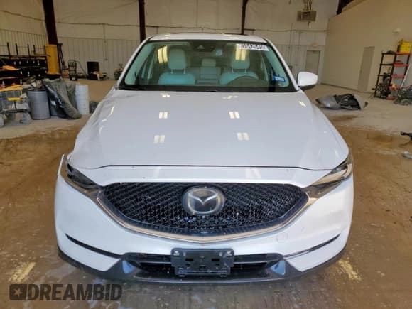 ✅ 2018 Mazda CX-5 Grand Touring • VIN: JM3KFBDM7J0344272 • Лот: 81642645. Опубликован ранее на Copart с пробегом 80 955 миль. Бесплатный доступ к архиву аукционных продаж из США и подробный отчёт об истории автомобиля на DreamBid. Изображение 5.