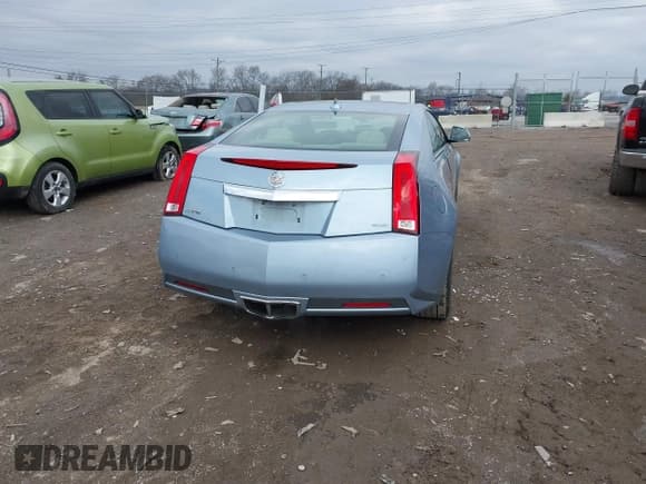 ✅ 2013 Cadillac CTS Performance • VIN: 1G6DJ1E30D0116444 • Lot: 41570540. Listed on IAAI with 104,660 mi. Free auction sales archive from the USA and detailed vehicle history report at DreamBid. Image 16.