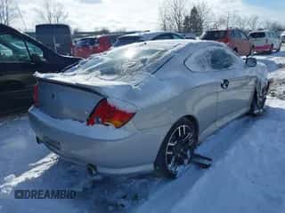 2003 Hyundai Tiburon GT z VIN KMHHN65F73U017682, wystawiony jako IAAI lot #41551560 z przebiegiem 112 904 mil mil oraz . Historia ofert i sprzedaży dostępna na DreamBid. Obrazek 4.