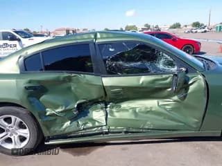 ✅ 2022 Dodge Charger SXT • VIN: 2C3CDXBG1NH138867 • Lot: 43454424. Listed on IAAI with 39,320 mi. Free auction sales archive from the USA and detailed vehicle history report at DreamBid. Image 6.