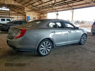 ✅ 2015 Lincoln MKS EcoBoost • VIN: 1LNHL9FT7FG603894 • Lot: 94300245. Wystawiony na Copart z przebiegiem 99 579 mil. Bezpłatny archiwum sprzedaży aukcyjnych z USA i szczegółowy raport historii pojazdu na DreamBid. Zdjęcie 3.