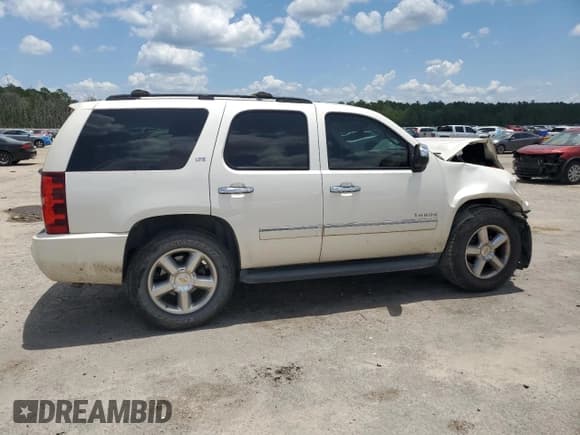 ✅ 2014 Chevrolet Tahoe LTZ • VIN: 1GNSCCE07ER121175 • Лот: 62642925. Опубликован ранее на Copart с пробегом Не указан. Бесплатный доступ к архиву аукционных продаж из США и подробный отчёт об истории автомобиля на DreamBid. Изображение 3.