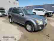 2010 Mercury Mariner Premier с VIN 4M2CN9HG9AKJ15491, выставлен на аукционе Copart как лот 70665985 с пробегом 198 092 миль миль и На запчасти • Non repairable. История ставок и продаж доступна на DreamBid. Изображение 4.