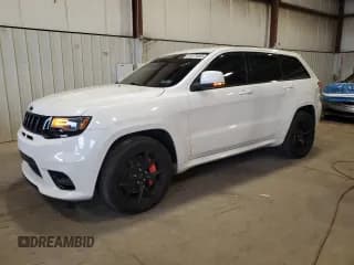 ✅ 2020 Jeep Grand Cherokee SRT • VIN: 1C4RJFDJ7LC413465 • Лот: 81673085. Опубликован ранее на Copart с пробегом 79 815 миль. Бесплатный доступ к архиву аукционных продаж из США и подробный отчёт об истории автомобиля на DreamBid. Изображение 1.