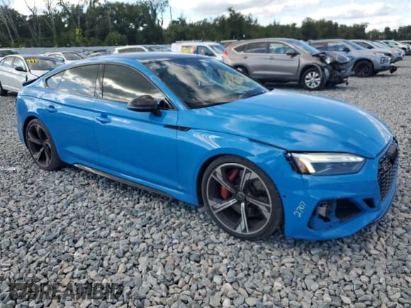 ✅ 2022 Audi RS 5 Sportback • VIN: WUAAWCF51NA901969 • Lot: 86469725. Listed on Copart with 49,524 mi. Free auction sales archive from the USA and detailed vehicle history report at DreamBid. Image 4.