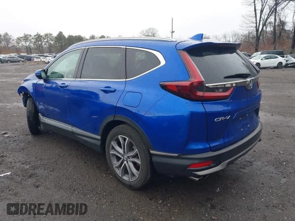 ✅ 2022 Honda CR-V Touring • VIN: 7FARW2H97NE052484 • Lot: 41793923. Listed on IAAI with 31,491 mi. Free auction sales archive from the USA and detailed vehicle history report at DreamBid. Image 3.