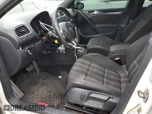 ✅ 2012 Volkswagen Golf GTI w/Sunroof & Navi • VIN: WVWHV7AJXCW345266 • Lot: 76408774. Wystawiony na Copart z przebiegiem 120 827 mil. Bezpłatny archiwum sprzedaży aukcyjnych z USA i szczegółowy raport historii pojazdu na DreamBid. Zdjęcie 7.