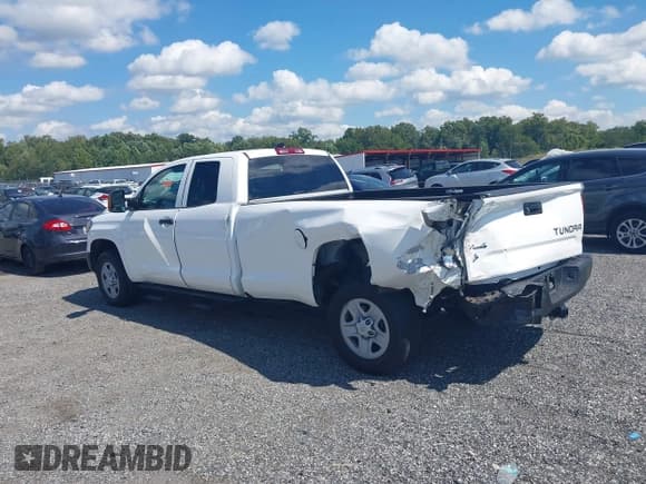 ✅ 2021 Toyota Tundra SR • VIN: 5TFCY5F10MX027263 • Lot: 42963423. Listed on IAAI with 27,429 mi. Free auction sales archive from the USA and detailed vehicle history report at DreamBid. Image 14.