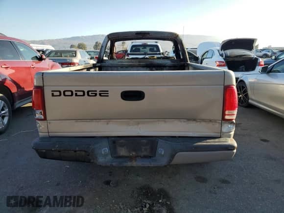 2000 Dodge Dakota z VIN 1B7FL26P7YS746821, wystawiony jako Copart lot #89311545 z przebiegiem Nie podano mil oraz Nie do naprawy • Non repairable. Historia ofert i sprzedaży dostępna na DreamBid. Obrazek 6.
