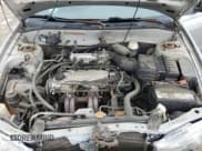 ✅ 2002 Mitsubishi Mirage DE • VIN: JA3AY11A22U015278 • Lot: 63560965. Listed on Copart with 135,306 mi. Free auction sales archive from the USA and detailed vehicle history report at DreamBid. Image 11.