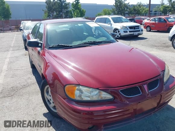 ✅ 1999 Pontiac Grand Am SE2 • VIN: 1G2NE52T0XM702788 • Lot: 42564414. Wystawiony na IAAI z przebiegiem 195 067 mil. Bezpłatny archiwum sprzedaży aukcyjnych z USA i szczegółowy raport historii pojazdu na DreamBid. Zdjęcie 6.