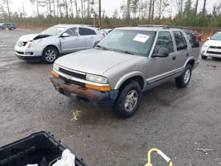 ✅ 2000 Chevrolet Blazer LT • VIN: 1GNDT13WXY2279737 • Lot: 41101393. Wystawiony na IAAI z przebiegiem 180 695 mil. Bezpłatny archiwum sprzedaży aukcyjnych z USA i szczegółowy raport historii pojazdu na DreamBid. Zdjęcie 2.