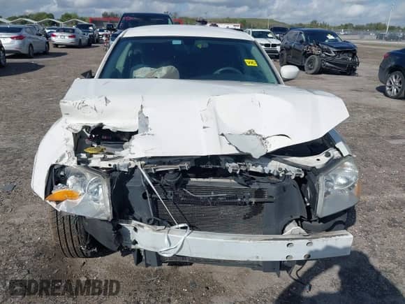 2006 Dodge Magnum с VIN 2D4FV47V06H446788, выставлен на аукционе IAAI как лот 41571984 с пробегом 244 231 миль миль и . История ставок и продаж доступна на DreamBid. Изображение 6.