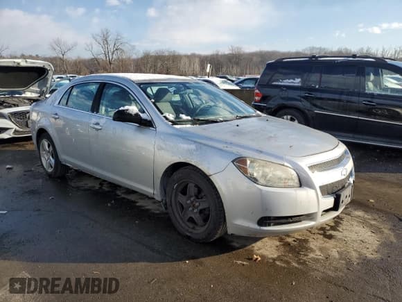 ✅ 2010 Chevrolet Malibu 1FL • VIN: 1G1ZA5E05AF193599 • Lot: 83136614. Listed on Copart with 160,541 mi. Free auction sales archive from the USA and detailed vehicle history report at DreamBid. Image 4.