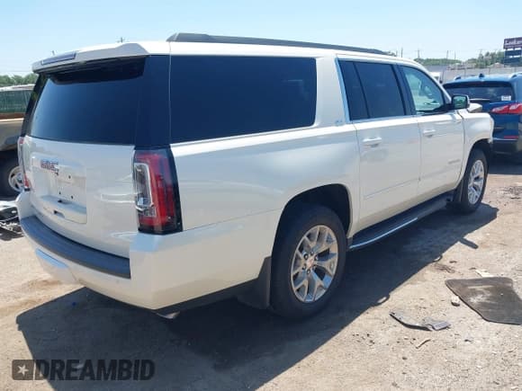 ✅ 2015 GMC Yukon XL SLT • VIN: 1GKS2HKC1FR621863 • Lot: 42672636. Listed on IAAI with 206,050 mi. Free auction sales archive from the USA and detailed vehicle history report at DreamBid. Image 4.