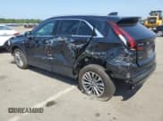 ✅ 2024 Cadillac XT4 AWD Premium Luxury • VIN: 1GYFZDR41RF184933 • Lot: 67077305. Wystawiony na Copart z przebiegiem 12 676 mil. Bezpłatny archiwum sprzedaży aukcyjnych z USA i szczegółowy raport historii pojazdu na DreamBid. Zdjęcie 2.
