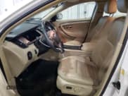 ✅ 2014 Ford Taurus SEL • VIN: 1FAHP2H81EG137876 • Lot: 91455125. Listed on Copart with 216,731 mi. Free auction sales archive from the USA and detailed vehicle history report at DreamBid. Image 7.