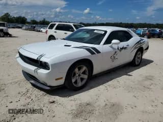 ✅ 2012 Dodge Challenger SXT • VIN: 2C3CDYAG3CH131004 • Lot: 72044844. Wystawiony na Copart z przebiegiem 162 740 mil. Bezpłatny archiwum sprzedaży aukcyjnych z USA i szczegółowy raport historii pojazdu na DreamBid. Zdjęcie 1.