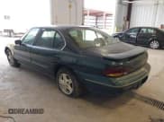 ✅ 1999 Pontiac Bonneville SE • VIN: 1G2HX52K0XH238196 • Лот: 42783319. Опубликован ранее на IAAI с пробегом 216 146 миль. Бесплатный доступ к архиву аукционных продаж из США и подробный отчёт об истории автомобиля на DreamBid. Изображение 3.