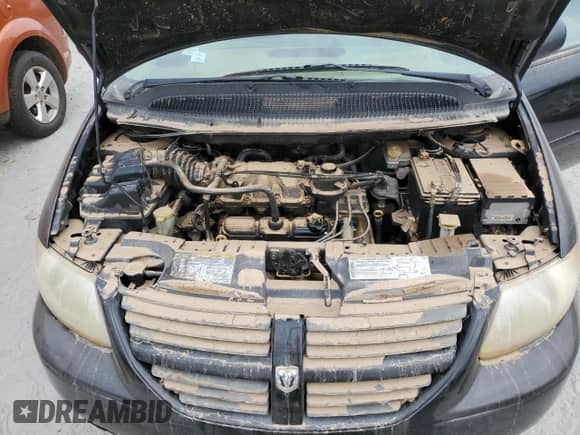 2005 Dodge Caravan SXT z VIN 2D4GP44LX5R544415, wystawiony jako Copart lot #74718984 z przebiegiem Nie podano mil oraz Szkoda całkowita • Salvage title. Historia ofert i sprzedaży dostępna na DreamBid. Obrazek 12.