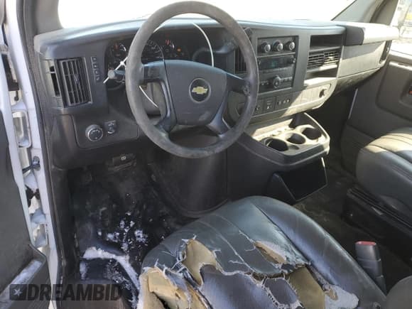 ✅ 2014 Chevrolet Express Cargo • VIN: 1GCWGGFA9E1105801 • Lot: 45789185. Listed on Copart with 117,119 mi. Free auction sales archive from the USA and detailed vehicle history report at DreamBid. Image 8.