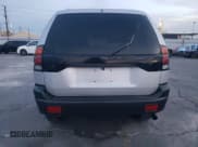 ✅ 2002 Mitsubishi Montero • VIN: JA4LS31RX2J024870 • Лот: 92631845. Опубликован ранее на Copart с пробегом 167 373 миль. Бесплатный доступ к архиву аукционных продаж из США и подробный отчёт об истории автомобиля на DreamBid. Изображение 6.