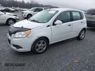 2011 Chevrolet Aveo 1LT z VIN KL1TD6DE4BB142084, wystawiony jako IAAI lot #41494751 z przebiegiem 212 720 mil mil oraz . Historia ofert i sprzedaży dostępna na DreamBid. Obrazek 2.