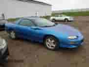1999 Chevrolet Camaro z VIN 2G1FP22K4X2114553, wystawiony jako Copart lot #58664935 z przebiegiem 147 118 mil mil oraz Czysty tytuł • Clean title. Historia ofert i sprzedaży dostępna na DreamBid. Obrazek 4.