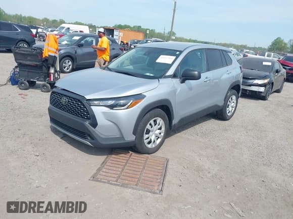 ✅ 2022 Toyota Corolla Cross L • VIN: 7MUAAAAG7NV009940 • Лот: 42117351. Опубликован ранее на IAAI с пробегом 23 290 миль. Бесплатный доступ к архиву аукционных продаж из США и подробный отчёт об истории автомобиля на DreamBid. Изображение 17.