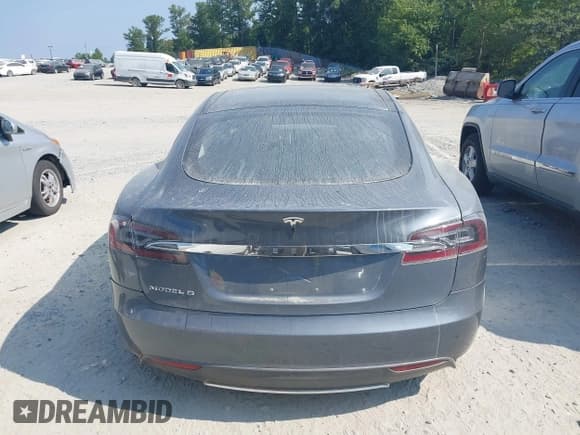 ✅ 2013 Tesla Model S Performance • VIN: 5YJSA1DPXDFP06497 • Lot: 43005300. Listed on IAAI with 33,940 mi. Free auction sales archive from the USA and detailed vehicle history report at DreamBid. Image 16.