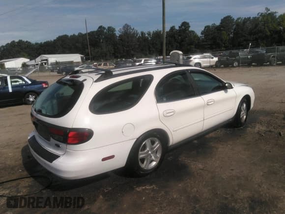 ✅ 2002 Ford Taurus • VIN: 1FAHP59U42G114858 • Lot: 42752752. Listed on IAAI with 73,062 mi. Free auction sales archive from the USA and detailed vehicle history report at DreamBid. Image 4.