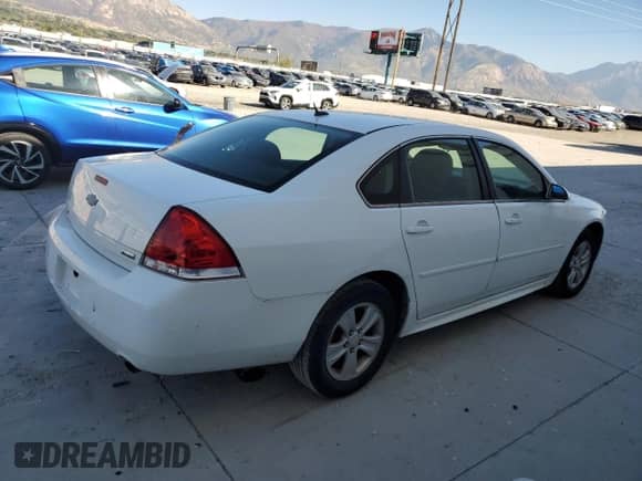2013 Chevrolet Impala LS with VIN 2G1WF5E37D1184588, listed as a Copart auction lot 82370615 with 220,421 mi miles and Salvage title. Bid and sale history available at DreamBid. Image 3.