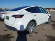 ✅ 2023 Tesla Model Y Long Range • VIN: 7SAYGDEE1PF814375 • Lot: 43598229. Wystawiony na IAAI z przebiegiem 59 943 mil. Bezpłatny archiwum sprzedaży aukcyjnych z USA i szczegółowy raport historii pojazdu na DreamBid. Zdjęcie 4.