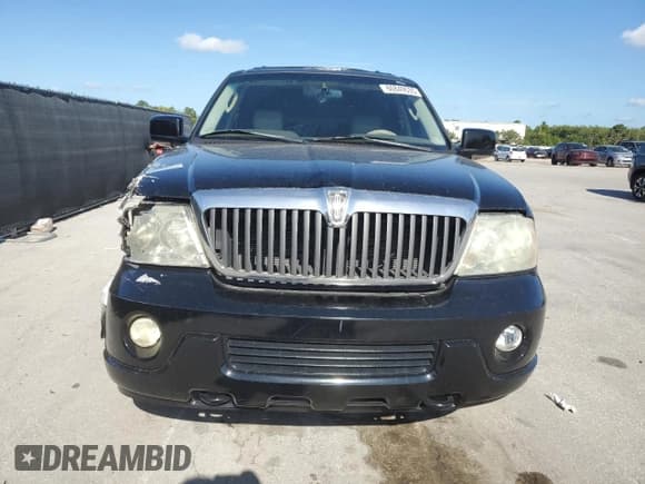 ✅ 2004 Lincoln Navigator Luxury • VIN: 5LMFU27R24LJ25237 • Lot: 60849535. Wystawiony na Copart z przebiegiem 223 734 mil. Bezpłatny archiwum sprzedaży aukcyjnych z USA i szczegółowy raport historii pojazdu na DreamBid. Zdjęcie 5.