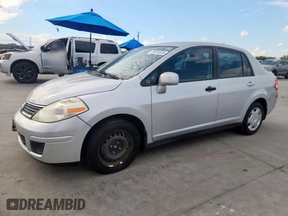 ✅ 2009 Nissan Versa SL • VIN: 3N1BC11E09L445986 • Lot: 85884035. Listed on Copart with 155,882 mi. Free auction sales archive from the USA and detailed vehicle history report at DreamBid. Image 1.