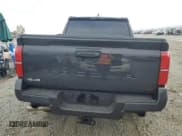 ✅ 2025 Toyota Tacoma SR5 • VIN: 3TMLB5JN9SM125531 • Лот: 86140655. Опубликован ранее на Copart с пробегом 6 018 миль. Бесплатный доступ к архиву аукционных продаж из США и подробный отчёт об истории автомобиля на DreamBid. Изображение 6.