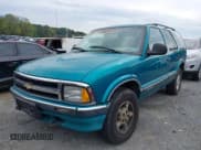 ✅ 1996 Chevrolet Blazer • VIN: 1GNDT13W3T2305670 • Lot: 43289049. Wystawiony na IAAI z przebiegiem 162 629 mil. Bezpłatny archiwum sprzedaży aukcyjnych z USA i szczegółowy raport historii pojazdu na DreamBid. Zdjęcie 6.