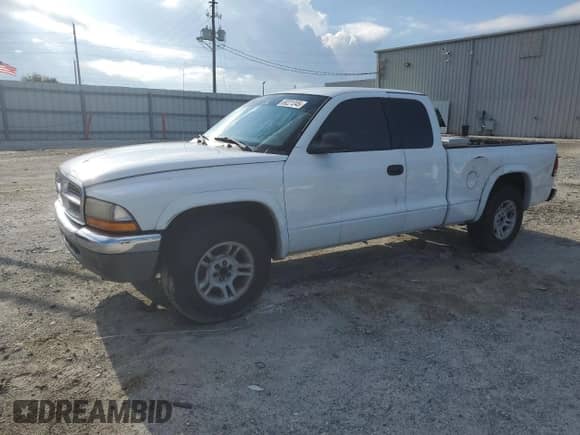 2002 Dodge Dakota SLT с VIN 1B7GL42N72S593692, выставлен на аукционе Copart как лот 69221245 с пробегом 141 599 миль миль и Списание • Salvage title. История ставок и продаж доступна на DreamBid. Изображение 1.