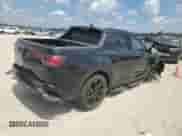 2024 Hyundai Santa Cruz Night Edition z VIN 5NTJCDDF7RH124723, wystawiony jako Copart lot #71933884 z przebiegiem Nie podano mil oraz Szkoda całkowita • Salvage title. Historia ofert i sprzedaży dostępna na DreamBid. Obrazek 3.