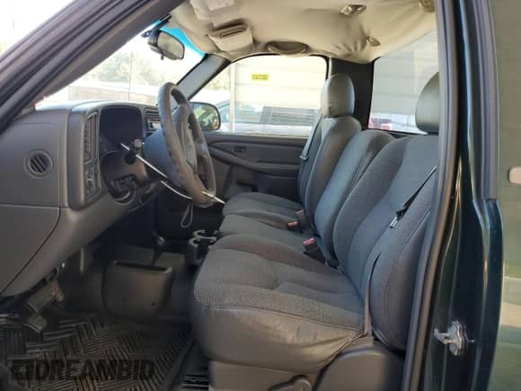 2004 Chevrolet Silverado 1500 Work Truck z VIN 1GCEK14V44Z262570, wystawiony jako Copart lot #76862394 z przebiegiem 138 432 mil mil oraz Szkoda całkowita • Salvage title. Historia ofert i sprzedaży dostępna na DreamBid. Obrazek 7.